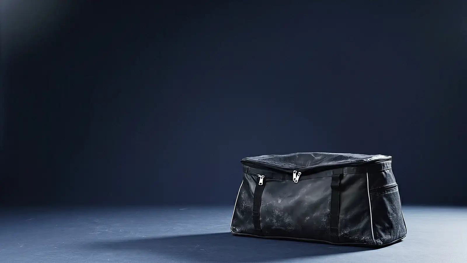 A hockey bag's contents laid out on a dressing-room floor — skates, helmet, gloves, a stick, a taped water bottle — gathering piece by piece back into the packed bag.